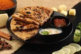 Paneer parantha with Curd & Pickle